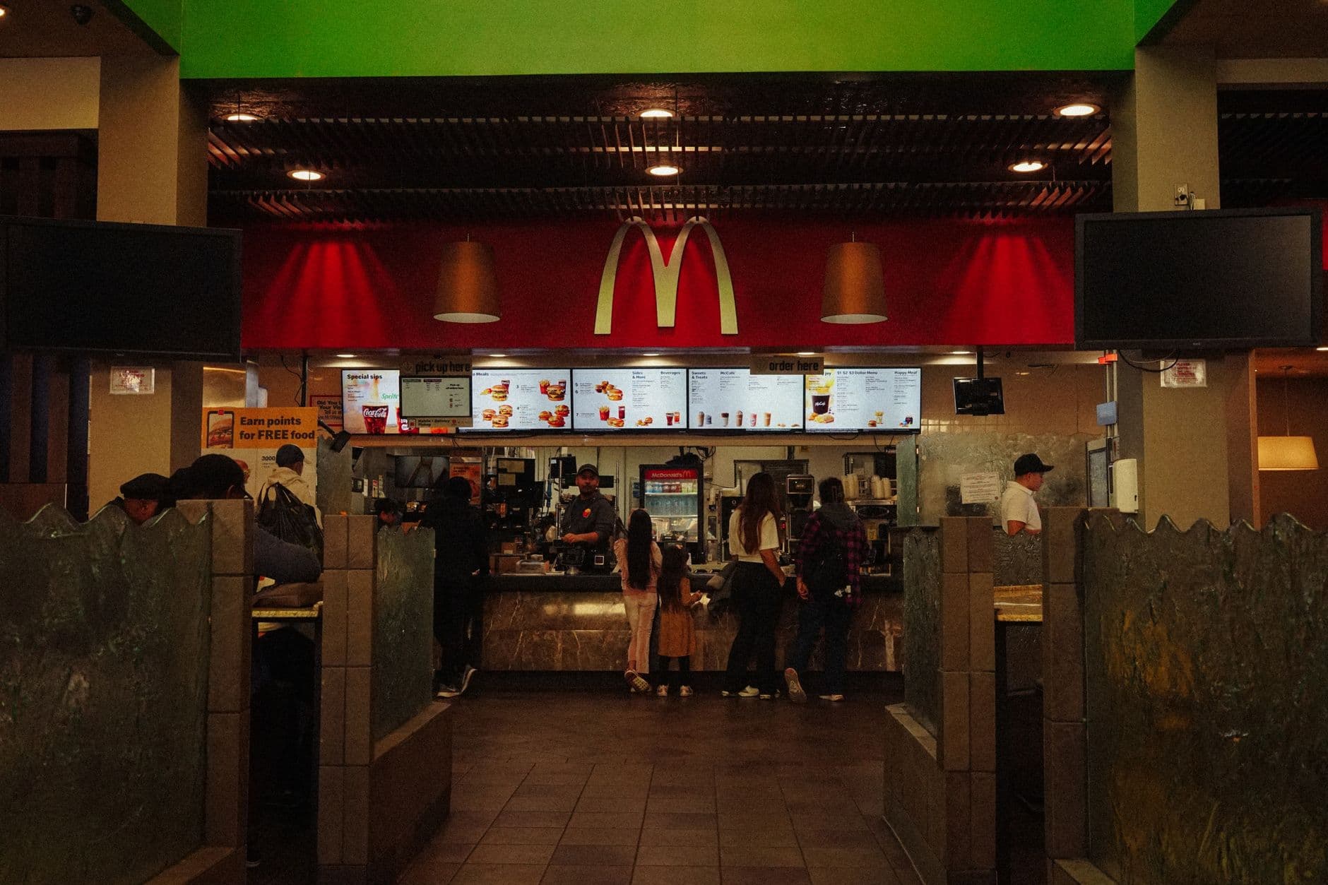 A restaurant interior under construction before a first franchise location opens.